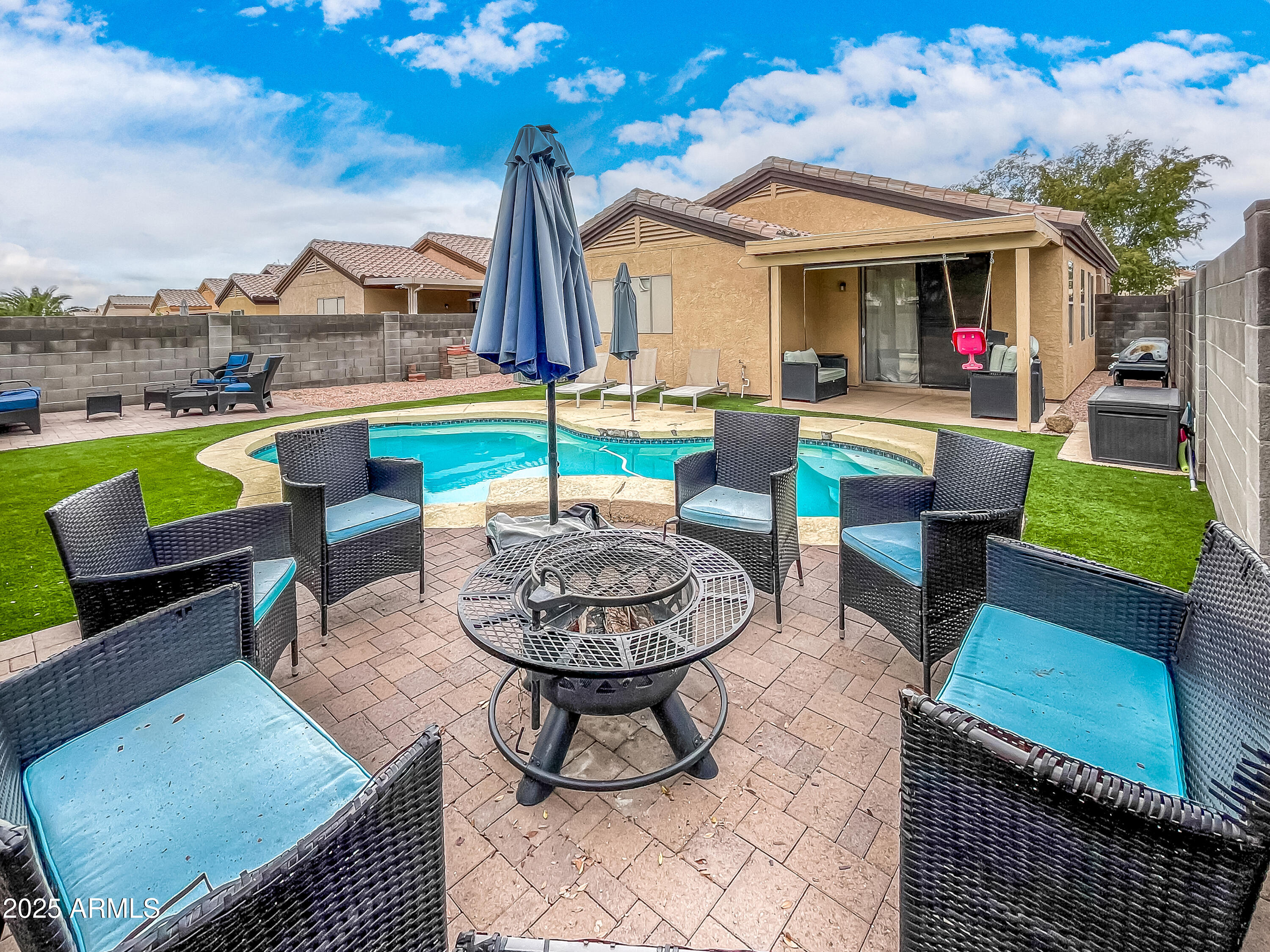10543 East Flossmoor Avenue Mesa, AZ 85208 - Photo 7 of 8 a view of a house with backyard and sitting area
