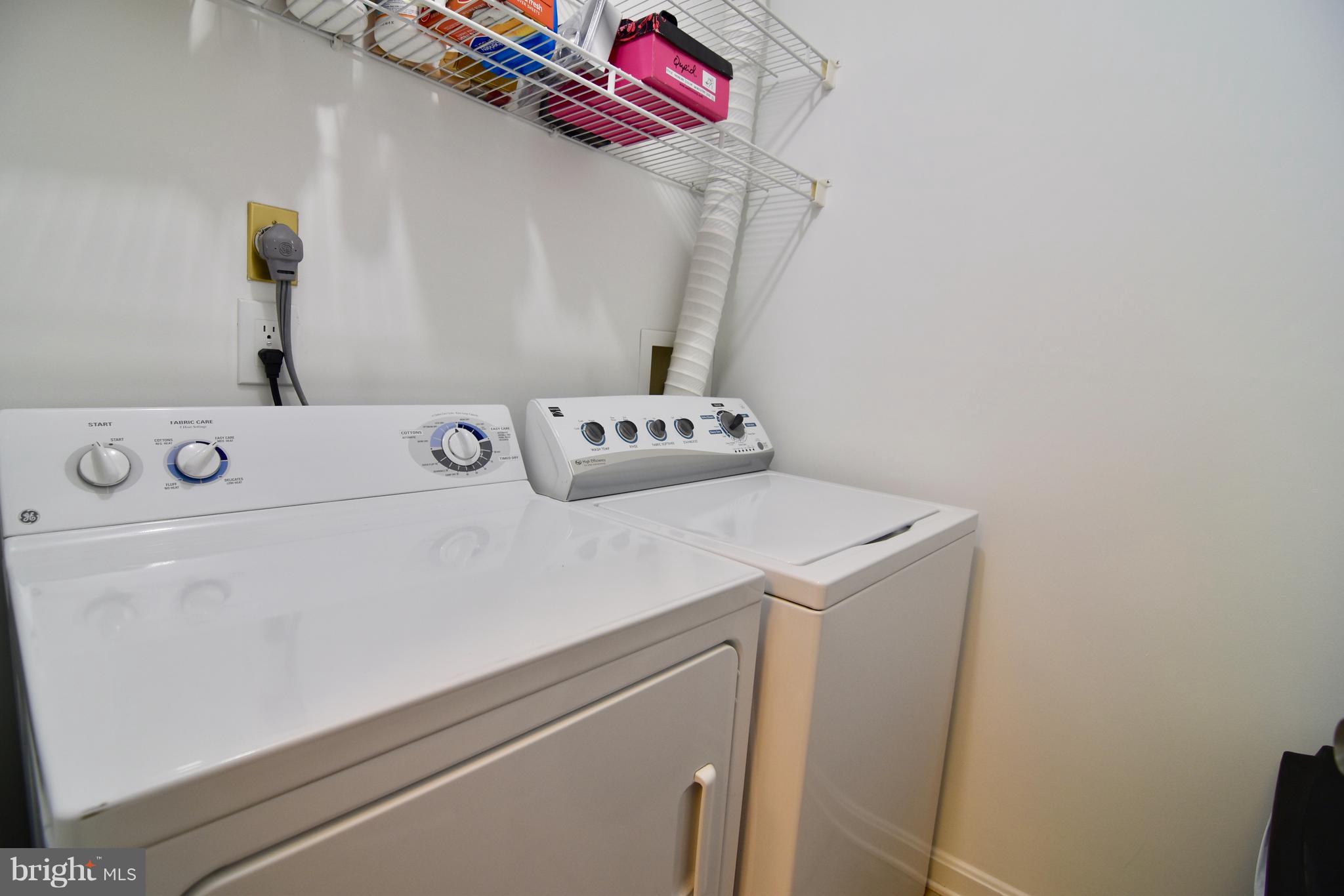 14903 Rydell Road, Unit 204 Centreville, VA 20121 - Photo 11 of 16 a utility room with dryer and washer