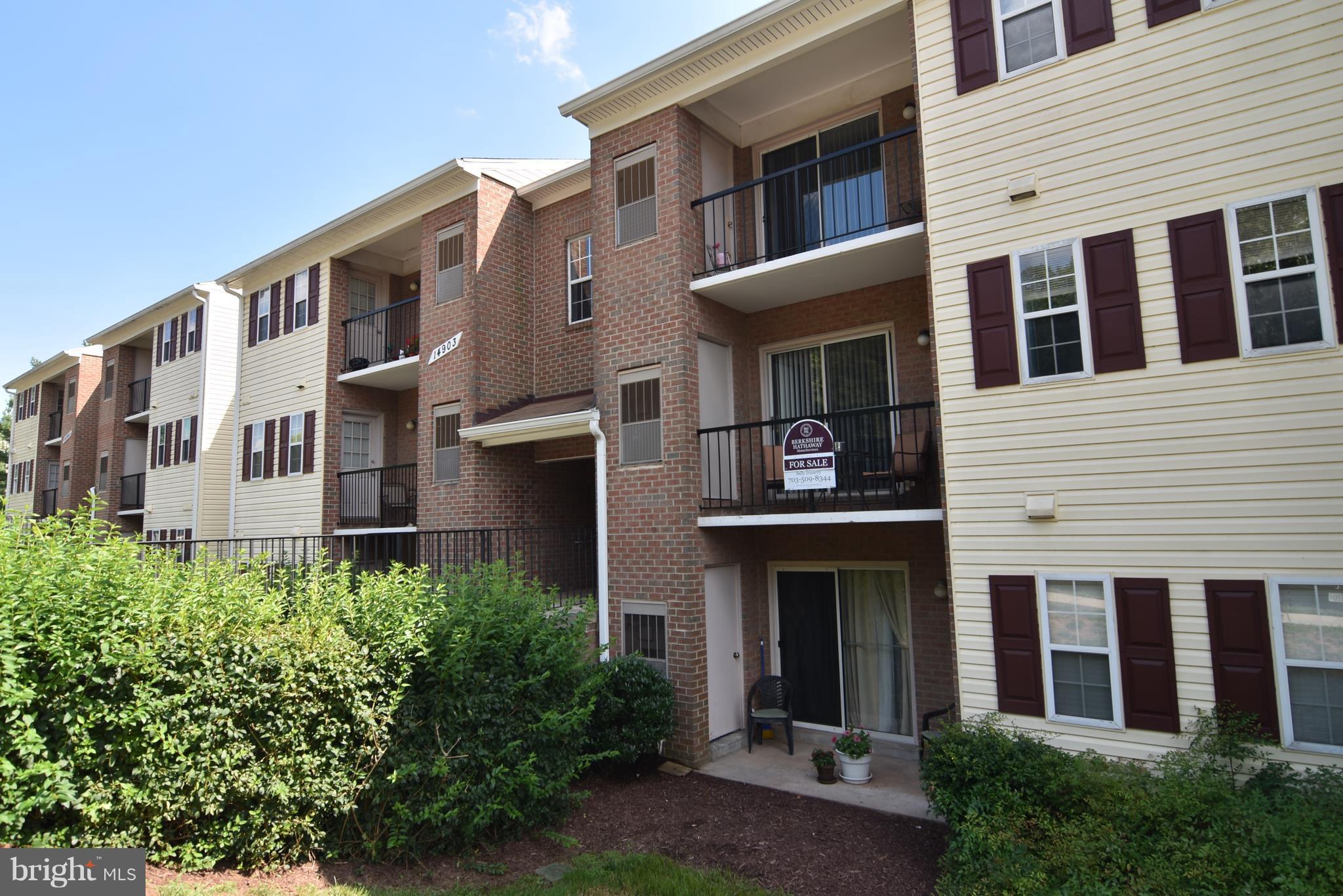 14903 Rydell Road, Unit 204 Centreville, VA 20121 - Photo 16 of 16 a view of a building with a yard