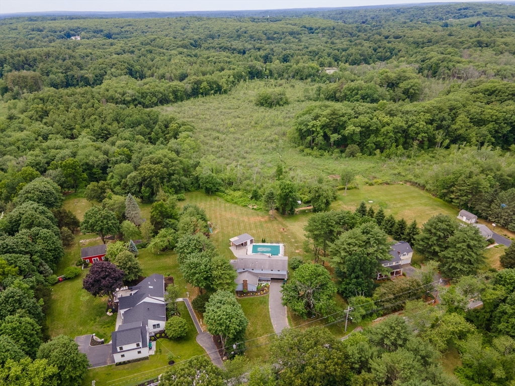 124 Everett Street Natick, MA 01760 - Photo 35 of 36 an aerial view of a house with a yard