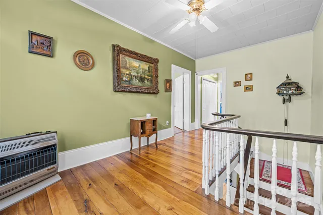 a view of a hallway with workspace
