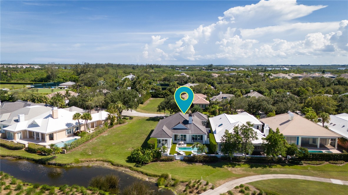61 Caribe Way Vero Beach, FL 32963 - Photo 31 of 36 an aerial view of residential houses with outdoor space and ocean view