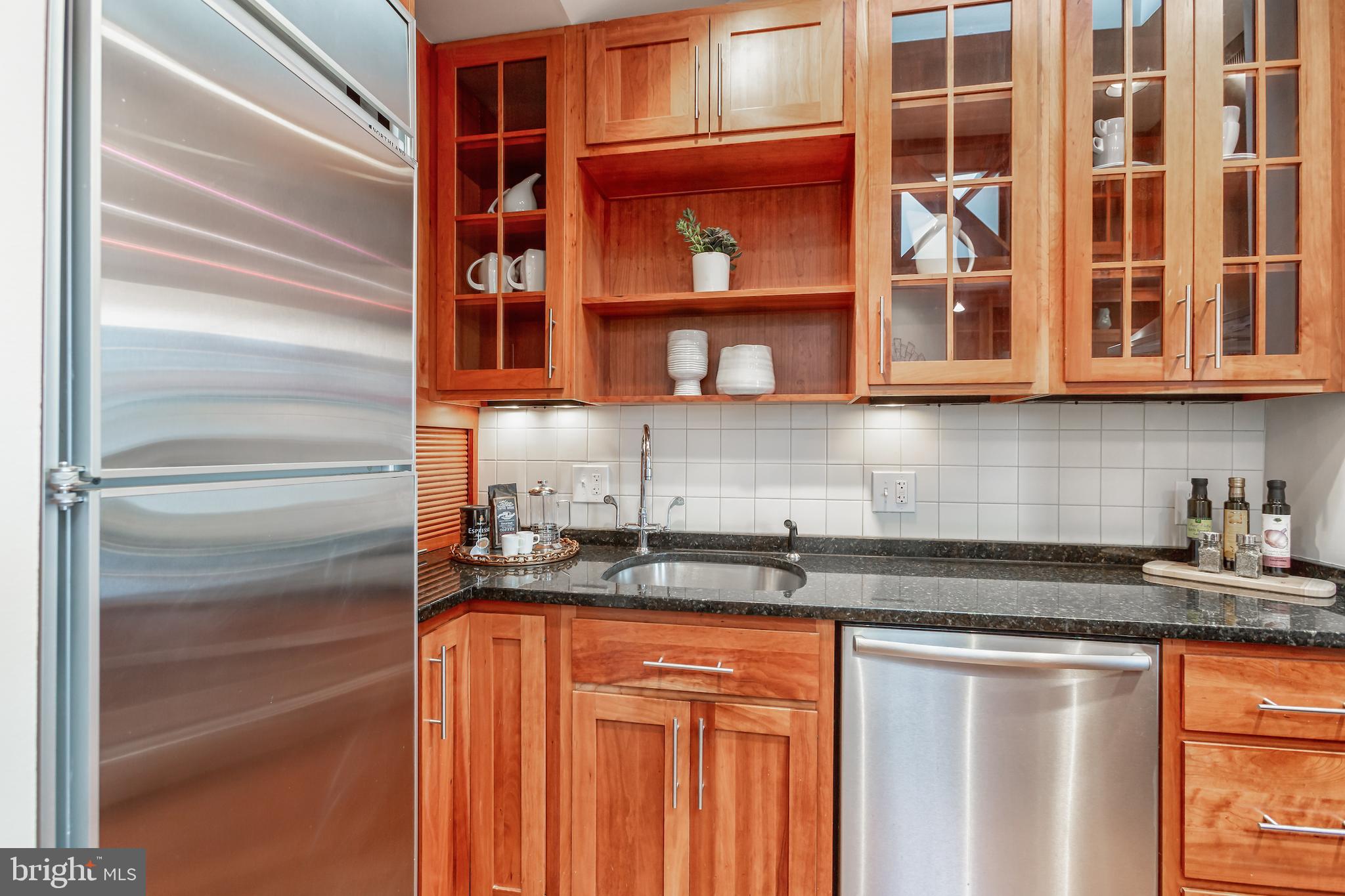 1762 Corcoran Street Northwest, Unit 4 Washington, DC 20009 - Photo 4 of 24 Stainless steel appliances & under cabinet lights