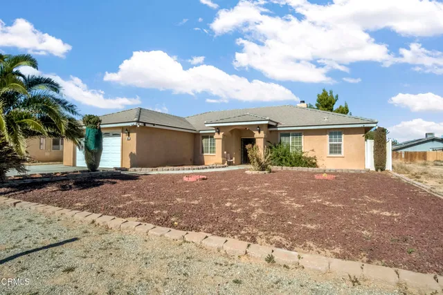 a view of a house with a patio