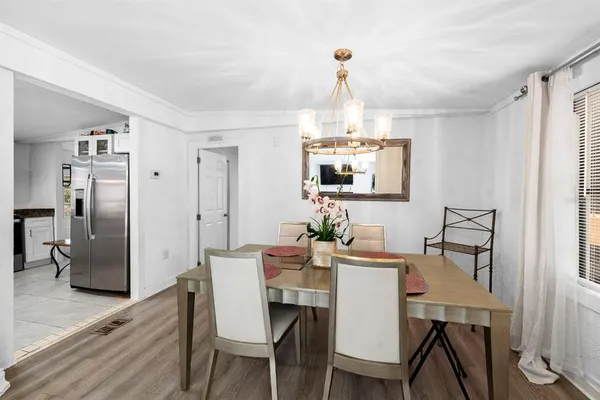 a view of a dining room with furniture