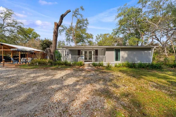 front view of house with a yard