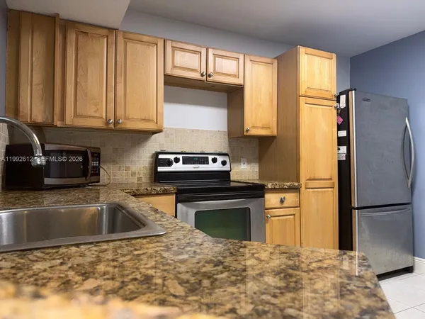 $225,533 | 8901 Wiles Road, Unit 103, Coral Springs, FL 33067