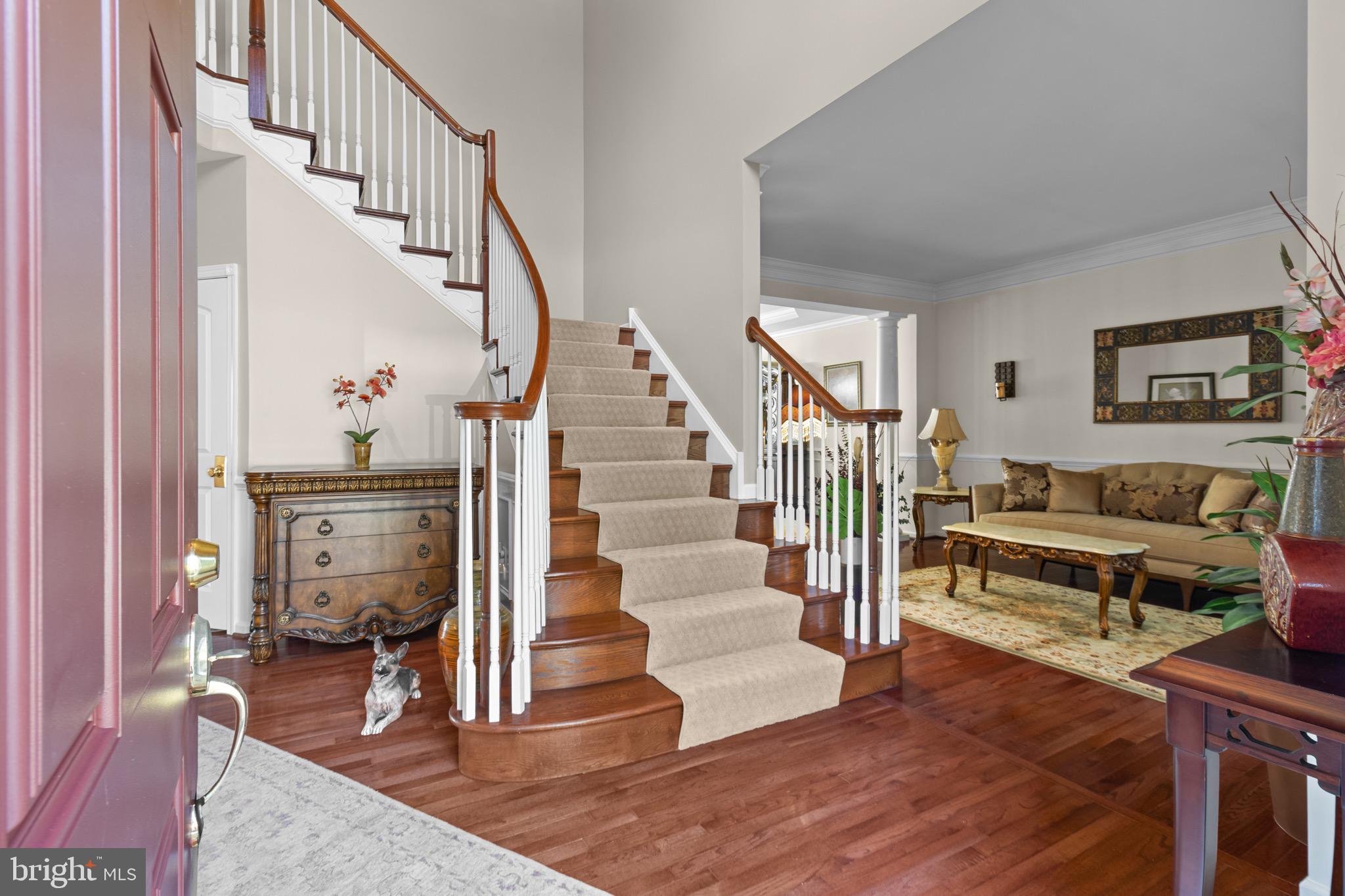 907 Mather Drive Bear, DE 19701 - Photo 18 of 80 a view of entryway livingroom and hall with wooden floor