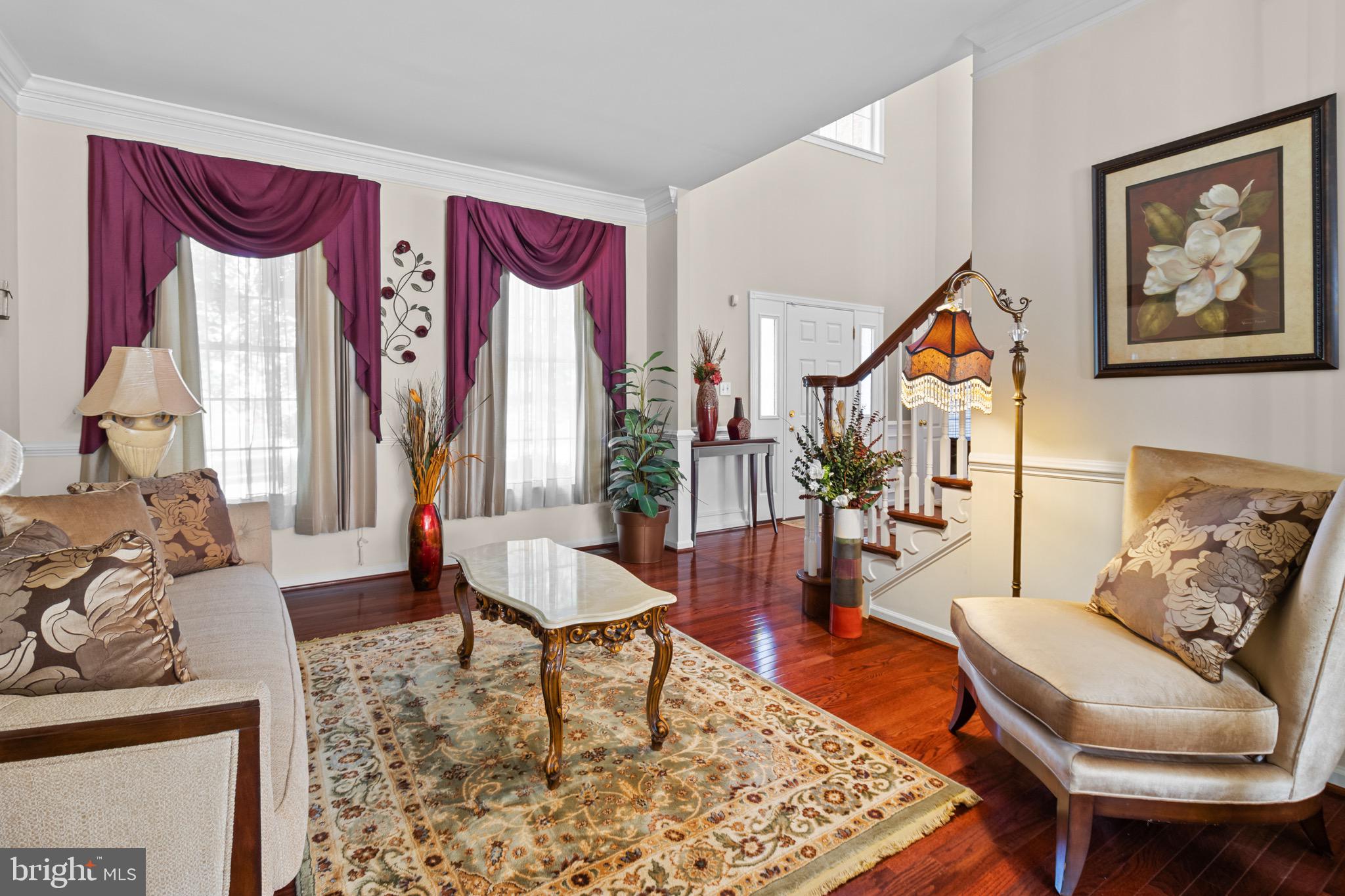 907 Mather Drive Bear, DE 19701 - Photo 24 of 80 a living room with furniture and a painting on the wall