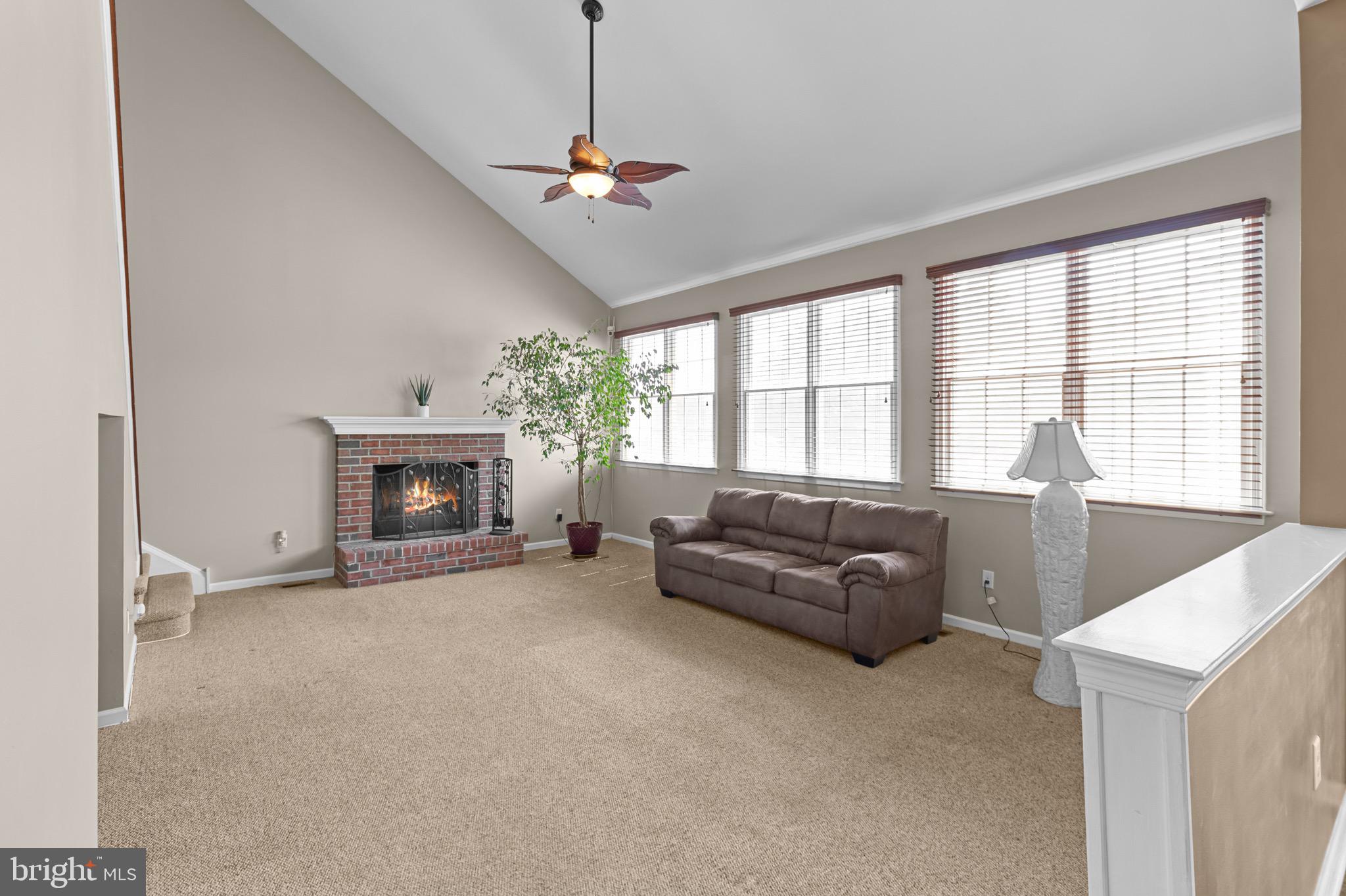 907 Mather Drive Bear, DE 19701 - Photo 40 of 80 a living room with furniture and a fireplace