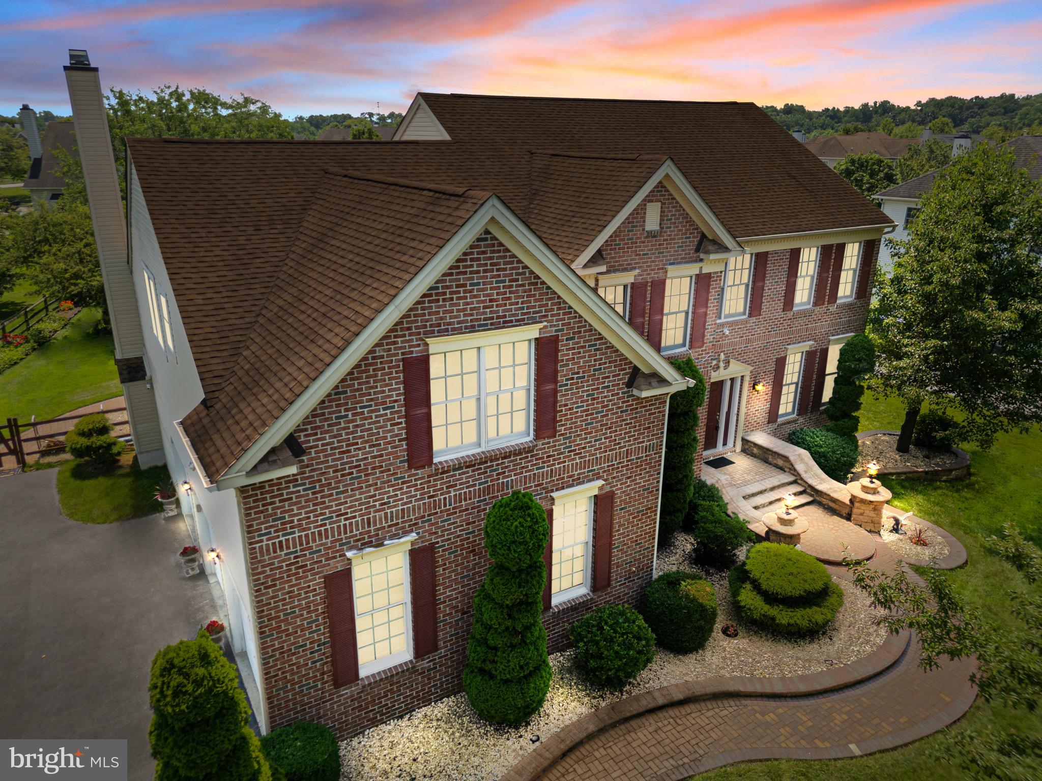907 Mather Drive Bear, DE 19701 - Photo 4 of 80 a aerial view of a house with a yard and potted plants