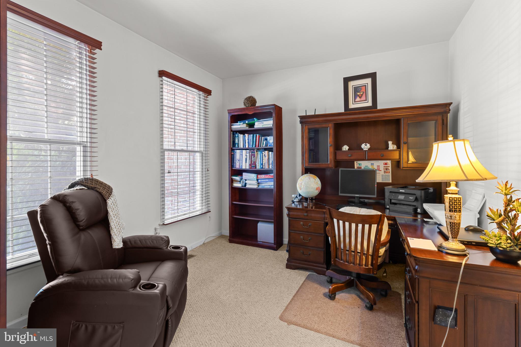 907 Mather Drive Bear, DE 19701 - Photo 47 of 80 a livingroom with workspace and a couch