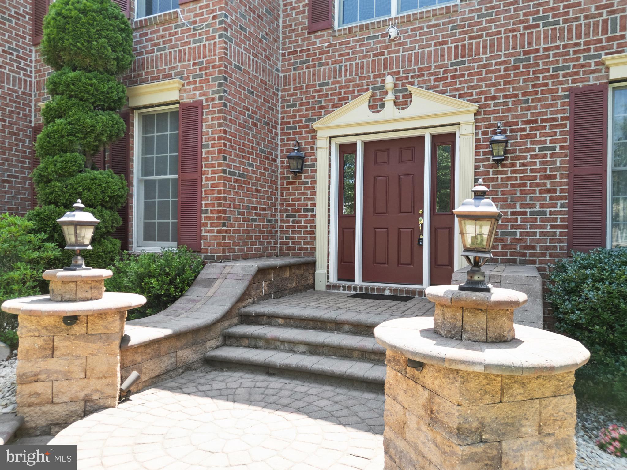 907 Mather Drive Bear, DE 19701 - Photo 5 of 80 a front view of a house with sitting area
