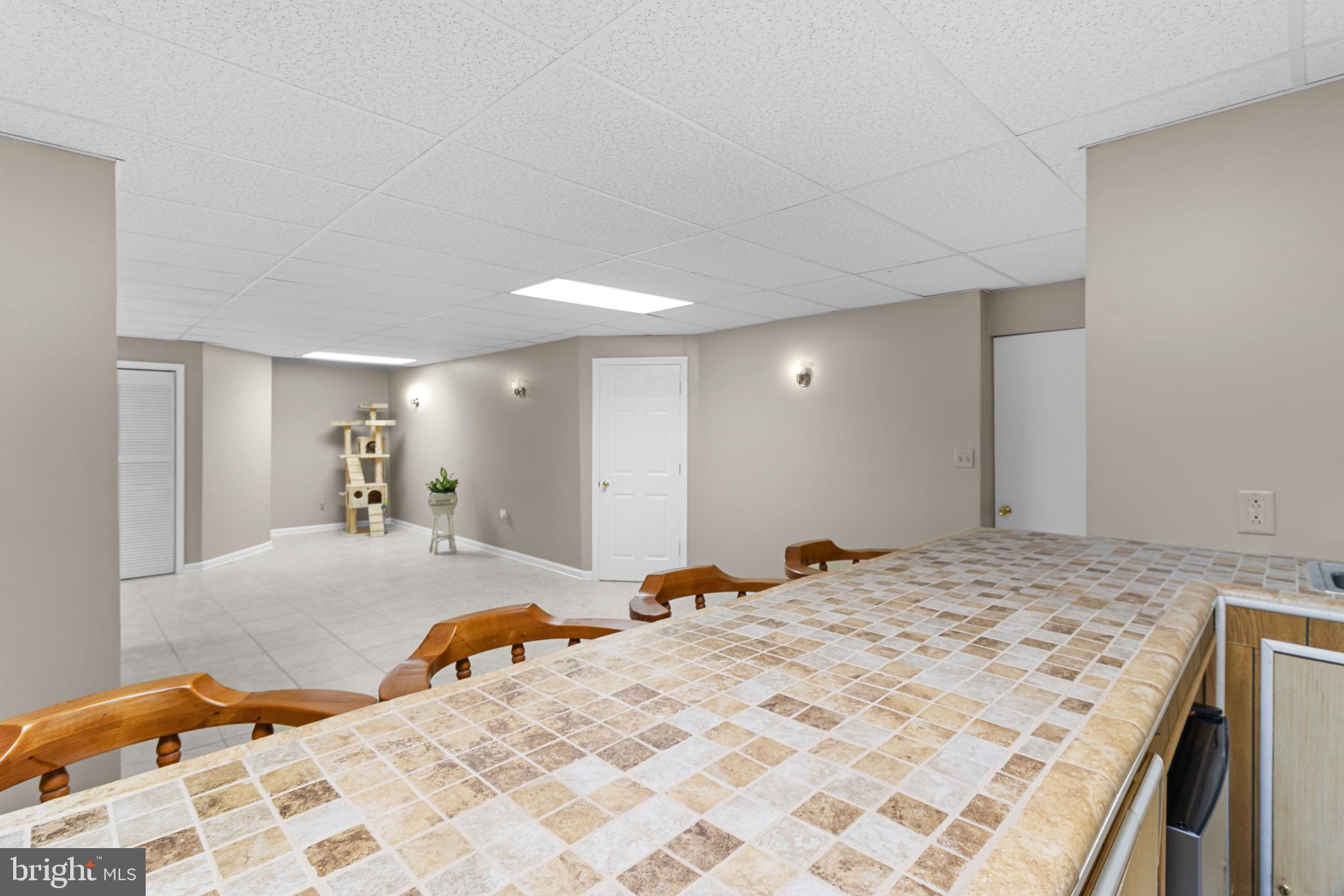 907 Mather Drive Bear, DE 19701 - Photo 53 of 80 a bed room with a bed and a couch