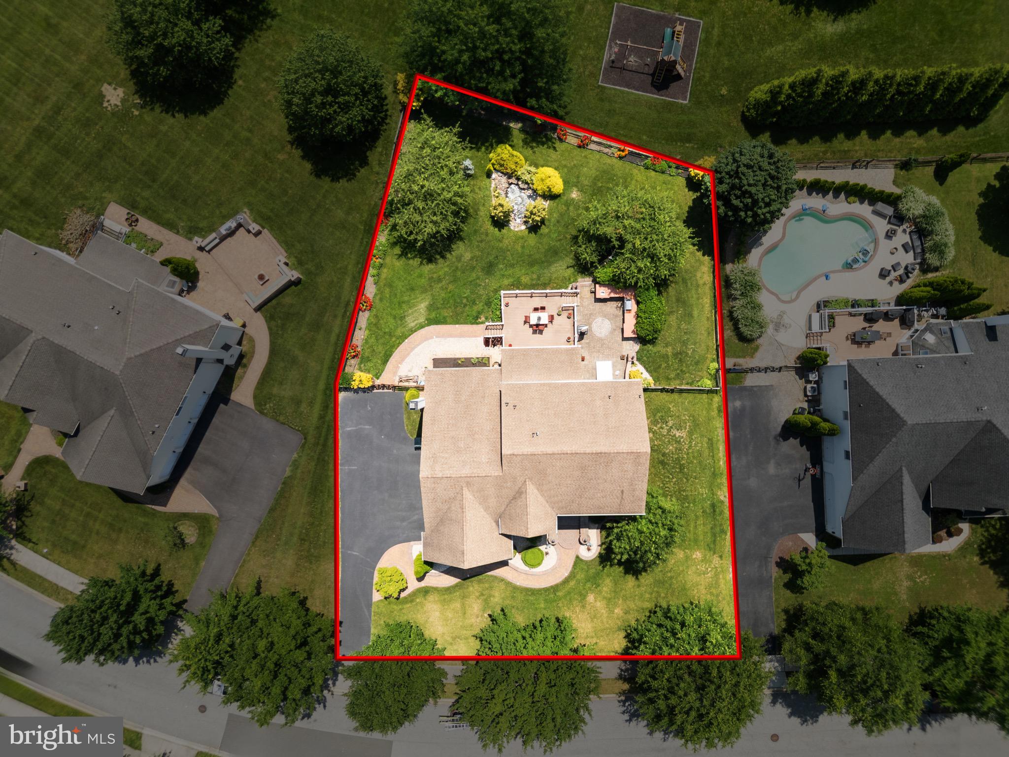 907 Mather Drive Bear, DE 19701 - Photo 76 of 80 an aerial view of a house with a yard and lake view