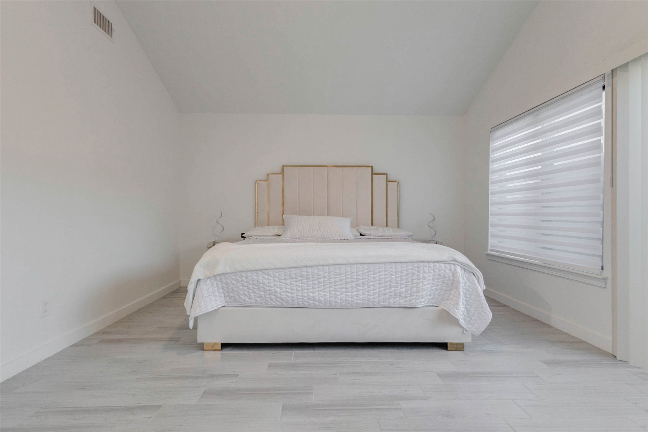 2223 Foreland Drive Houston, TX 77077 - Photo 20 of 39 a large white bed sitting in a bedroom next to a window