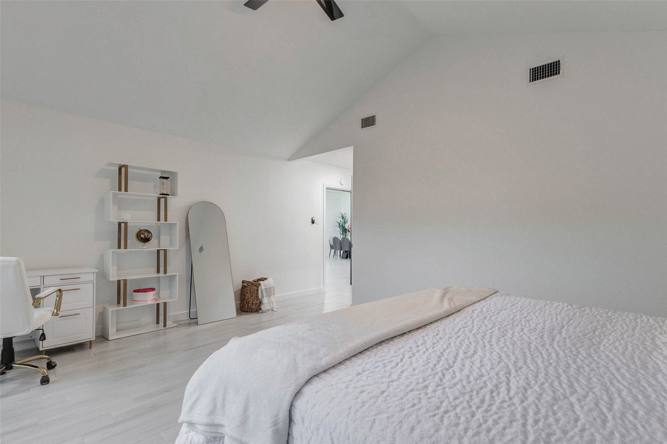 2223 Foreland Drive Houston, TX 77077 - Photo 21 of 39 a bedroom with a bed and a chair