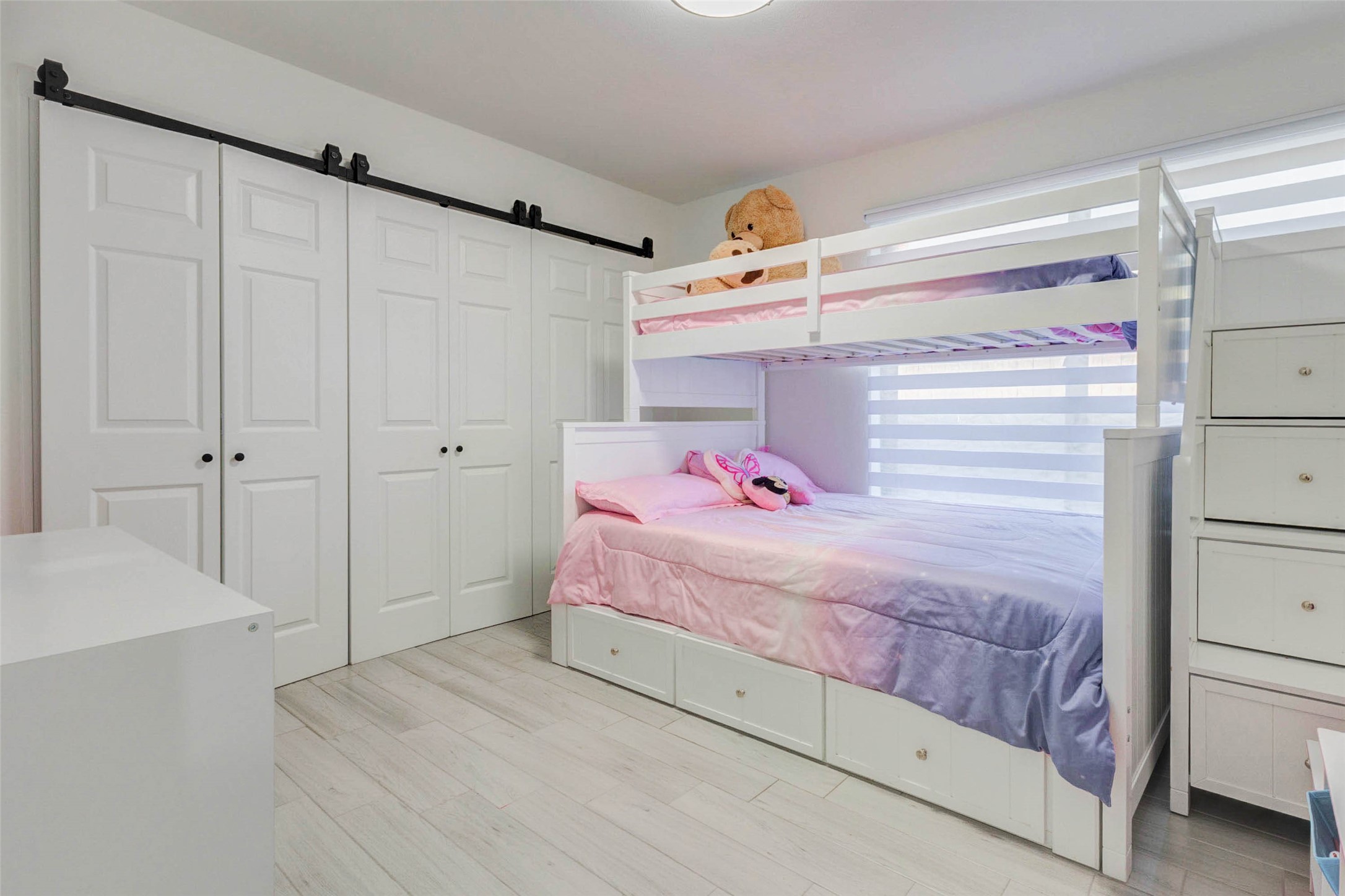 2223 Foreland Drive Houston, TX 77077 - Photo 30 of 39 a bedroom with a bed and a window