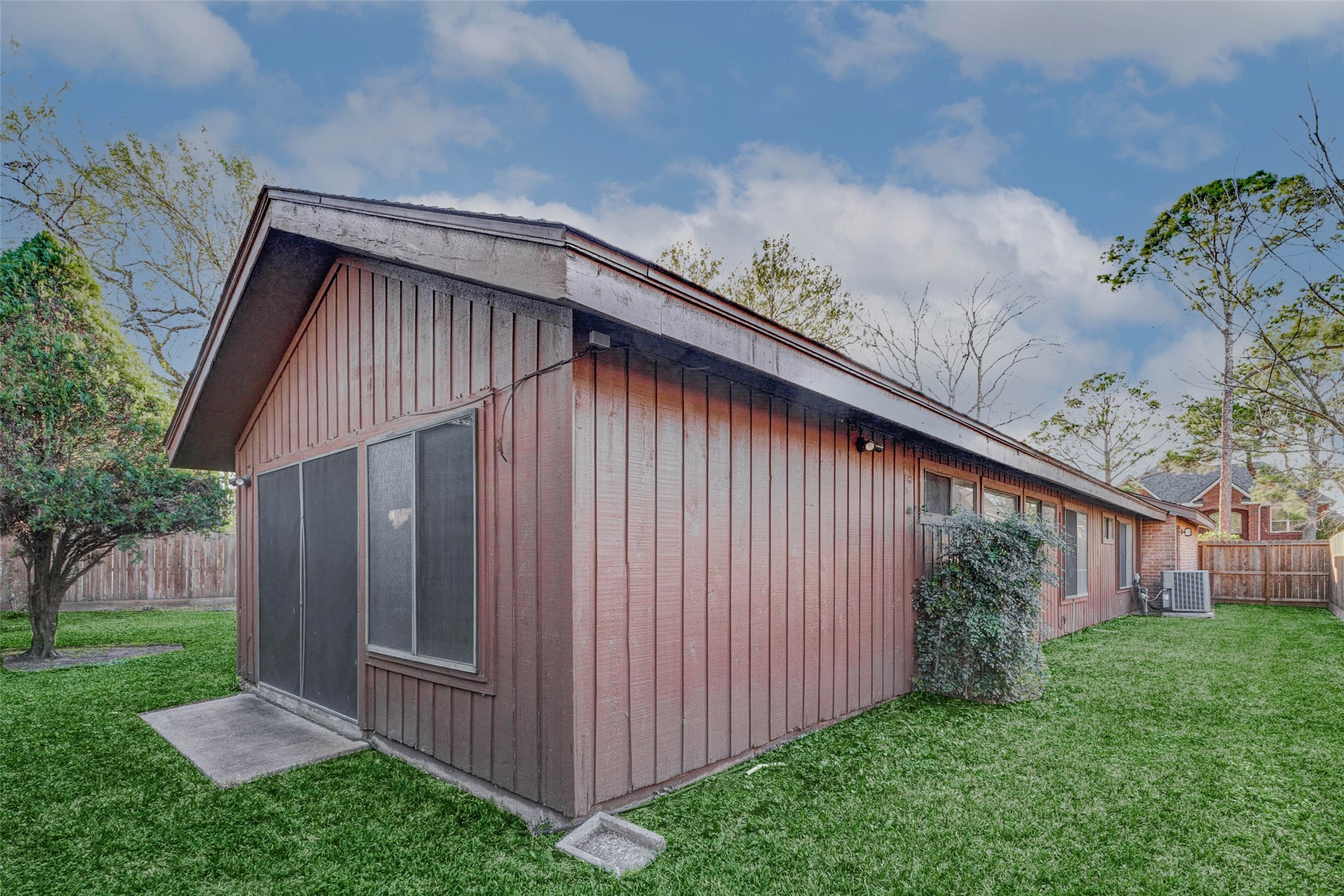 2223 Foreland Drive Houston, TX 77077 - Photo 37 of 39 a backyard of a house with lots of green space