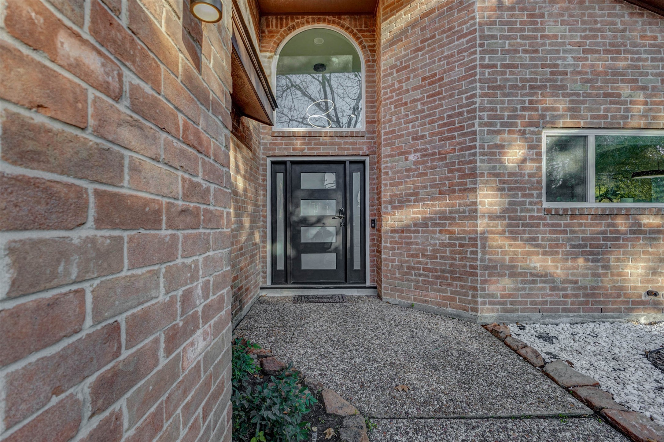 2223 Foreland Drive Houston, TX 77077 - Photo 4 of 39 a front view of a house with a garden