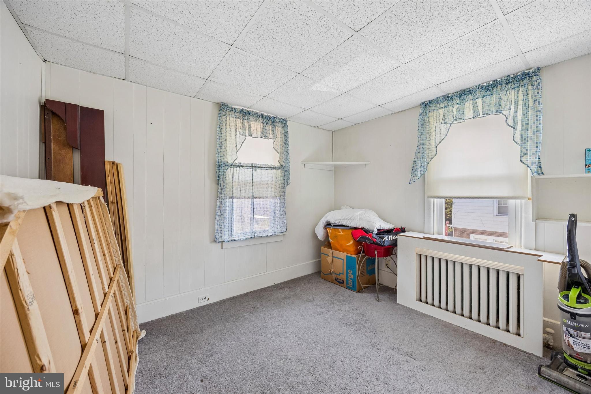 620 Gilbert Road Ridley Park, PA 19078 - Photo 27 of 35 a living room with a bed furniture and a window