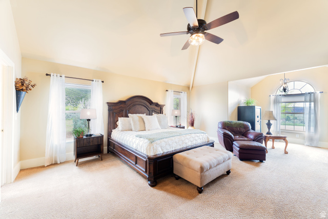 7343 North Sawtooth Cv Road Vernal, UT 84078 - Photo 16 of 64 Spacious master bedroom featuring vaulted ceilings, a ceiling fan