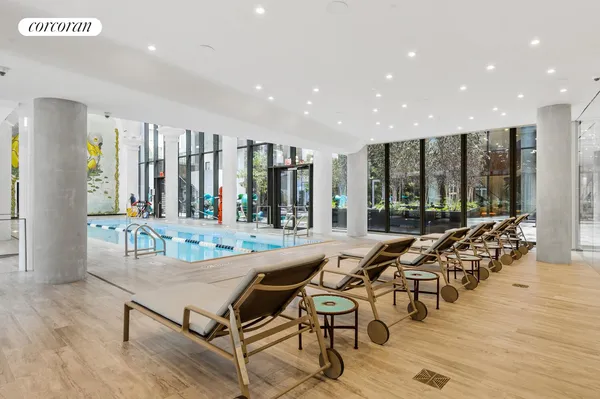 a view of a balcony with swimming pool