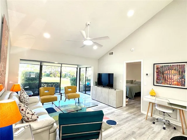 a kitchen with stainless steel appliances a stove a sink and a microwave