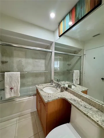 a view of a lake with a yard