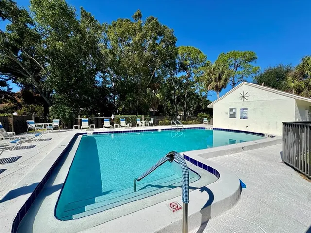 an aerial view of residential house with outdoor space