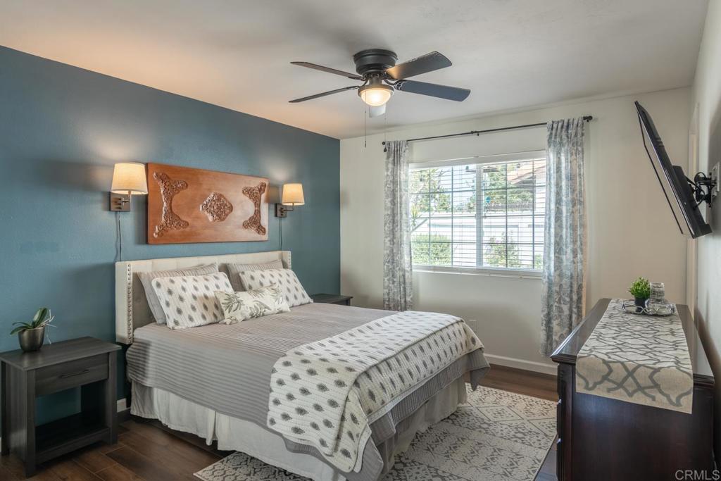 4872 Tarragon Drive Oceanside, CA 92057 - Photo 13 of 25 a bedroom with a bed and a window