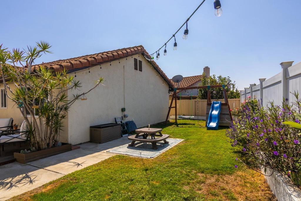 4872 Tarragon Drive Oceanside, CA 92057 - Photo 23 of 25 a view of a backyard with sitting area