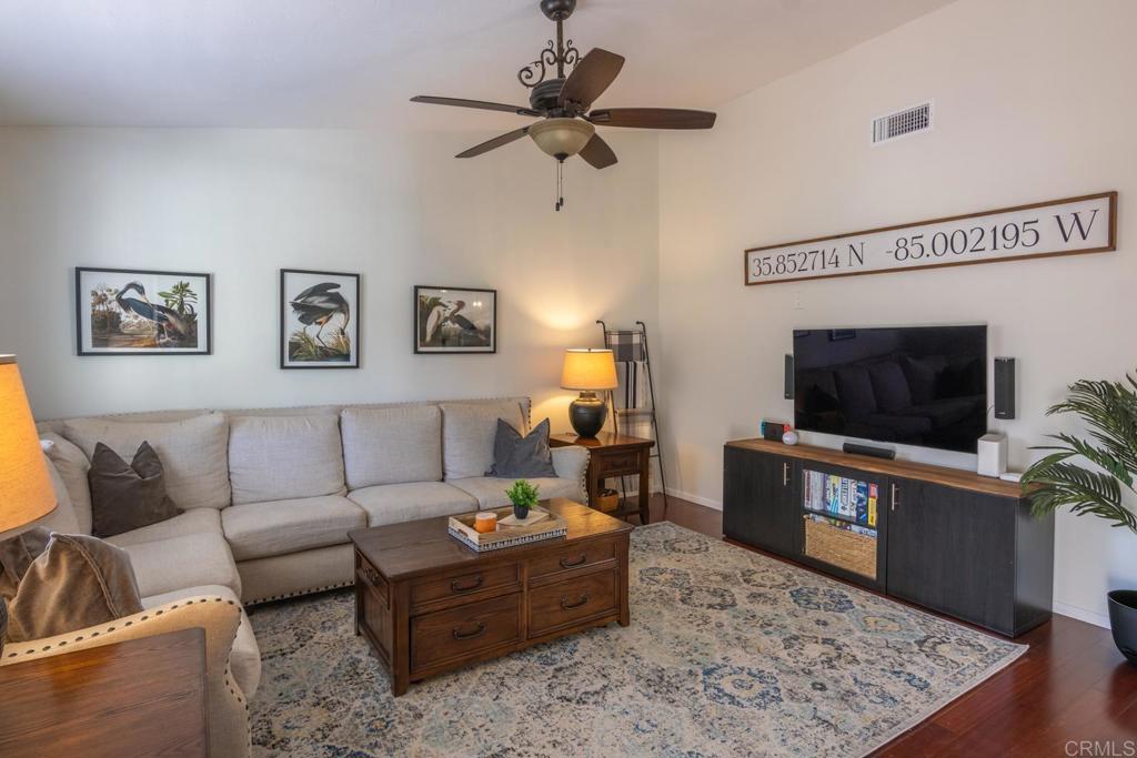 4872 Tarragon Drive Oceanside, CA 92057 - Photo 6 of 25 a living room with furniture and a flat screen tv