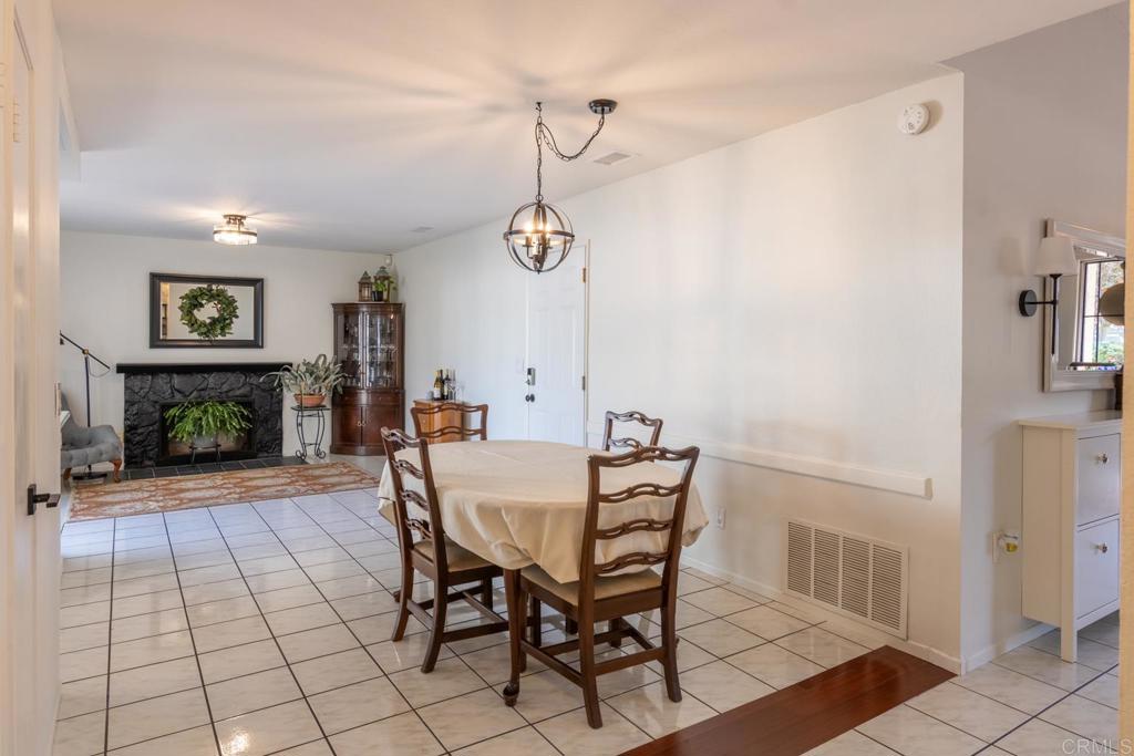4872 Tarragon Drive Oceanside, CA 92057 - Photo 8 of 25 a view of a livingroom with furniture and a fireplace