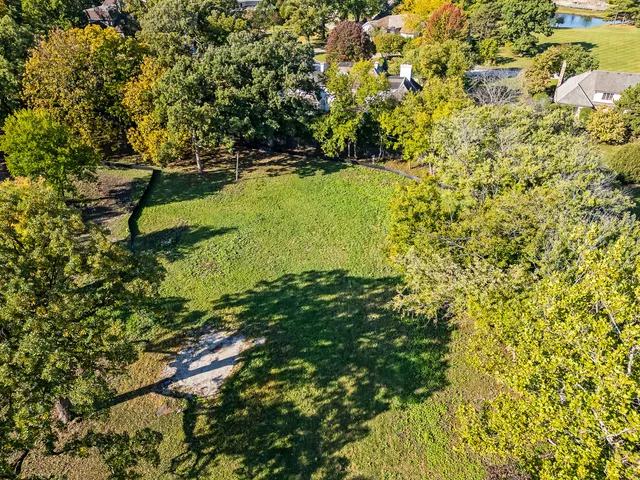 a view of swimming pool from a lake view