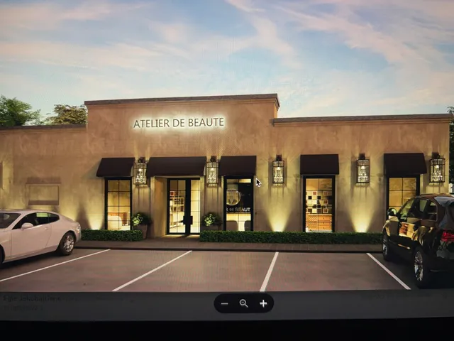 a view of a building with car parked