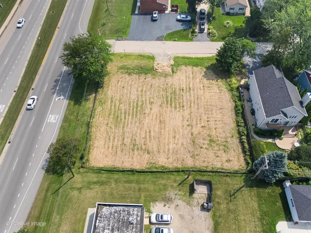 a view of a swimming pool with a bench