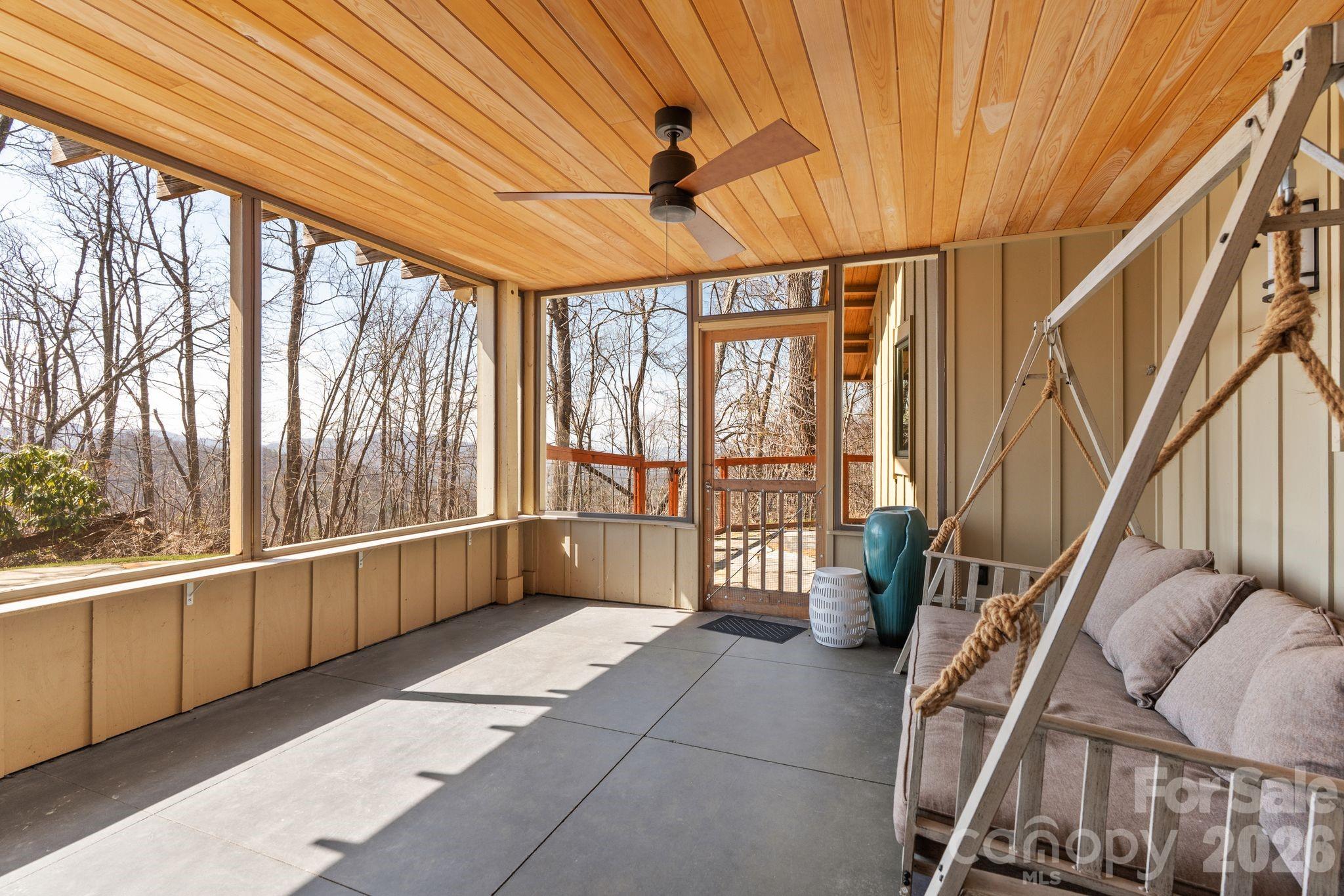 588 Long Branch Road Swannanoa, NC 28778 - Photo 14 of 46 a view of an empty room with windows