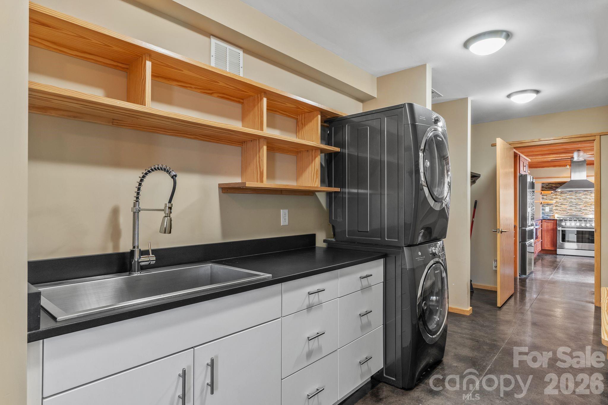 588 Long Branch Road Swannanoa, NC 28778 - Photo 20 of 46 a kitchen with a sink and cabinets