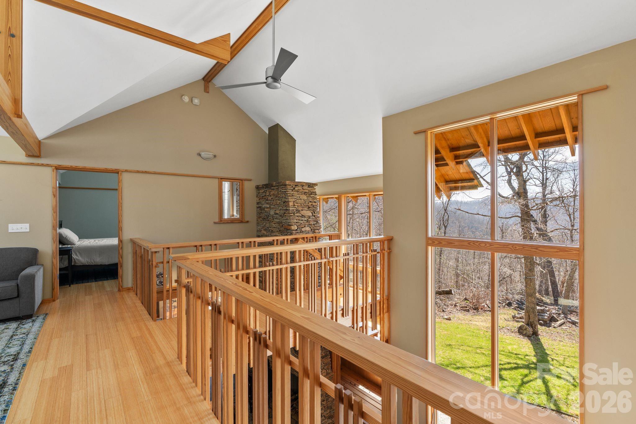588 Long Branch Road Swannanoa, NC 28778 - Photo 22 of 46 a view of staircase with furniture and a window
