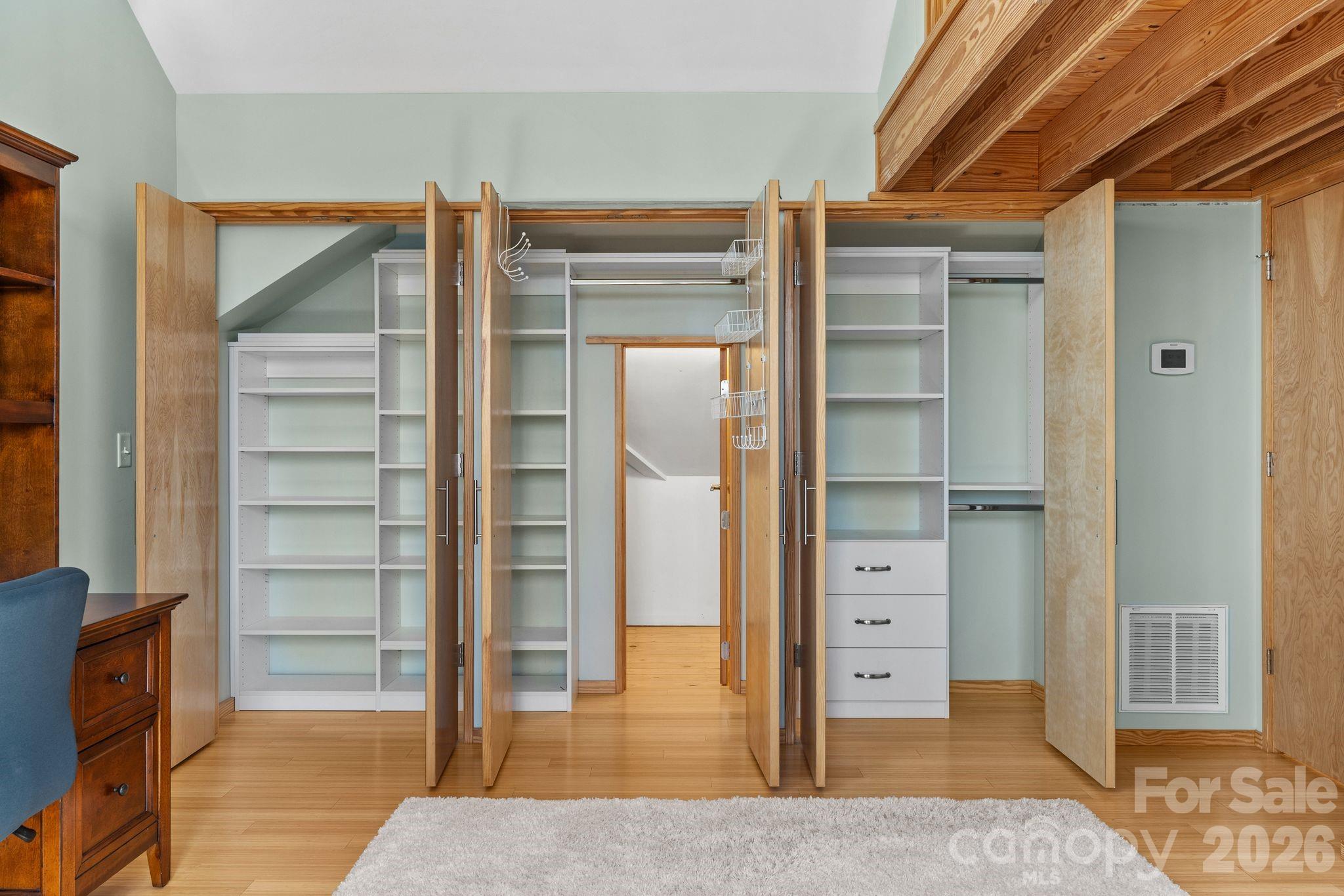 588 Long Branch Road Swannanoa, NC 28778 - Photo 32 of 46 a view of walk in closet with furniture
