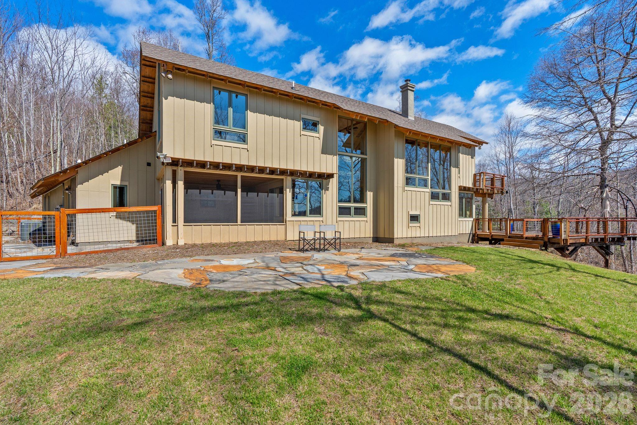 588 Long Branch Road Swannanoa, NC 28778 - Photo 38 of 46 a front view of a house with a yard