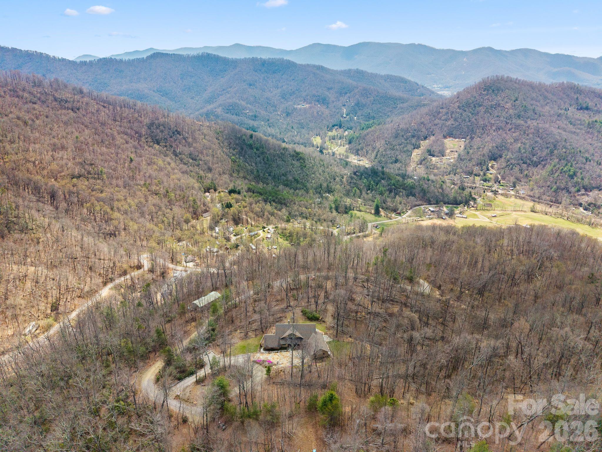588 Long Branch Road Swannanoa, NC 28778 - Photo 41 of 46 a view of a house with a mountain and mountains