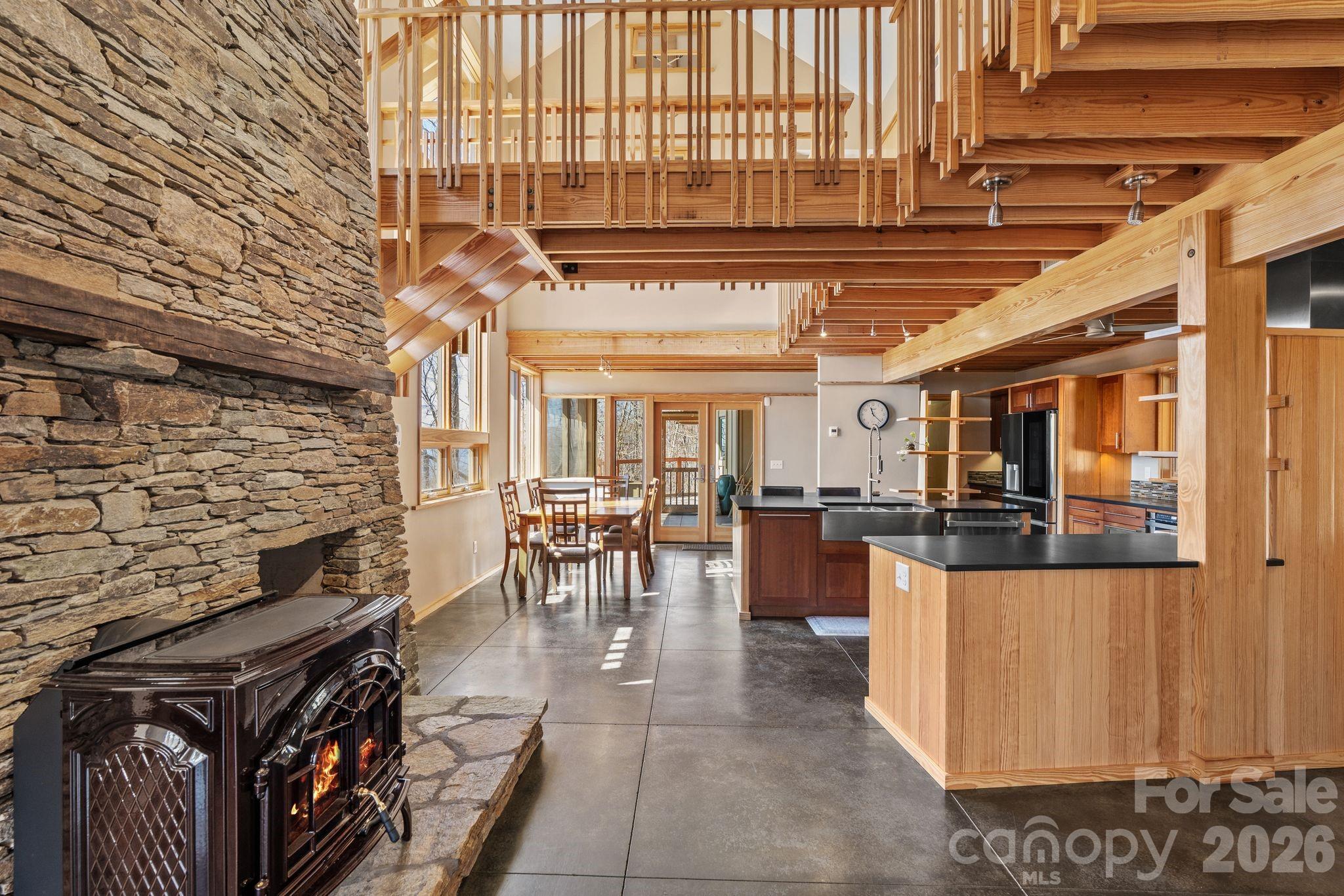588 Long Branch Road Swannanoa, NC 28778 - Photo 6 of 46 a view of a patio with a table and chairs