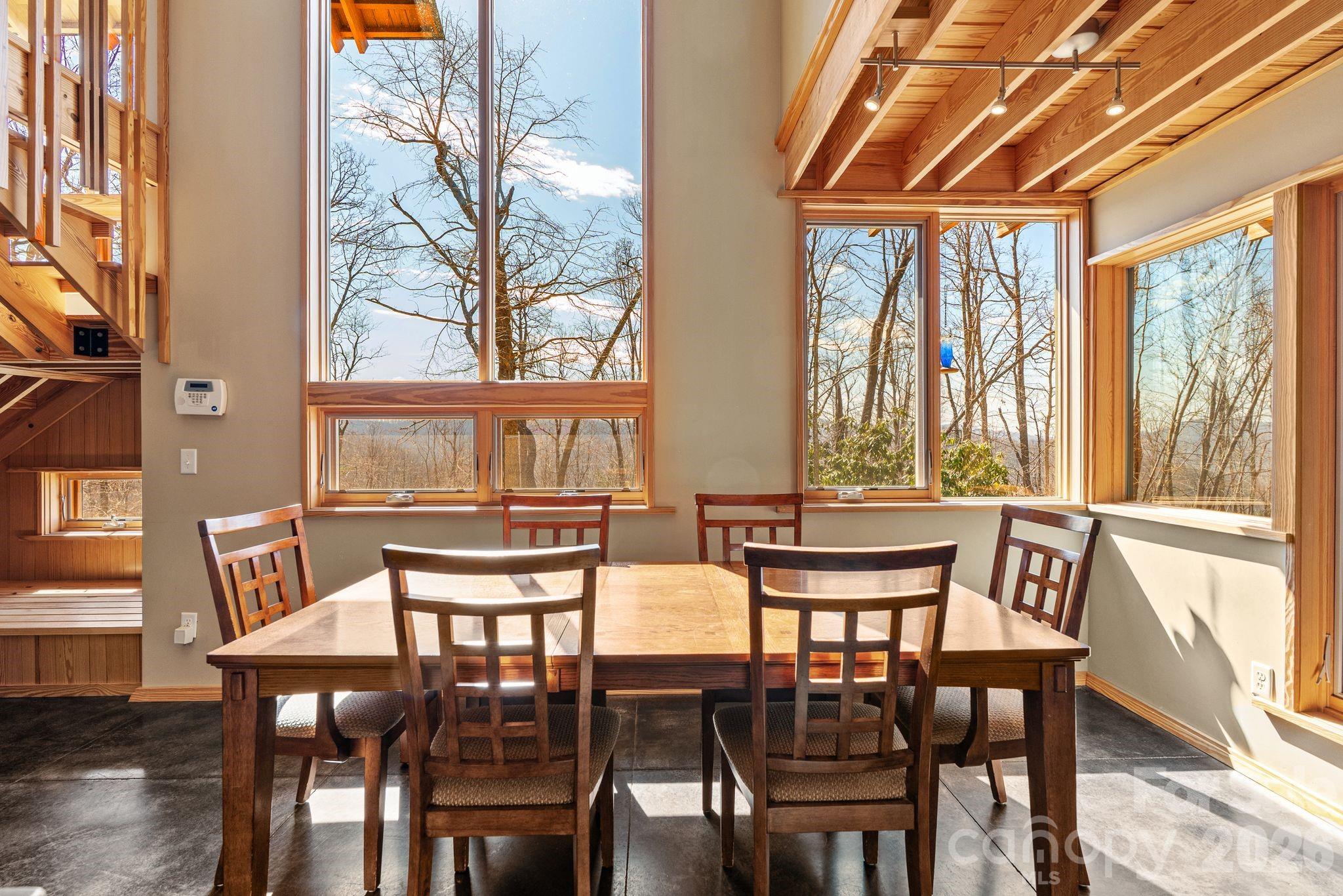 588 Long Branch Road Swannanoa, NC 28778 - Photo 7 of 46 a dining room with furniture and window