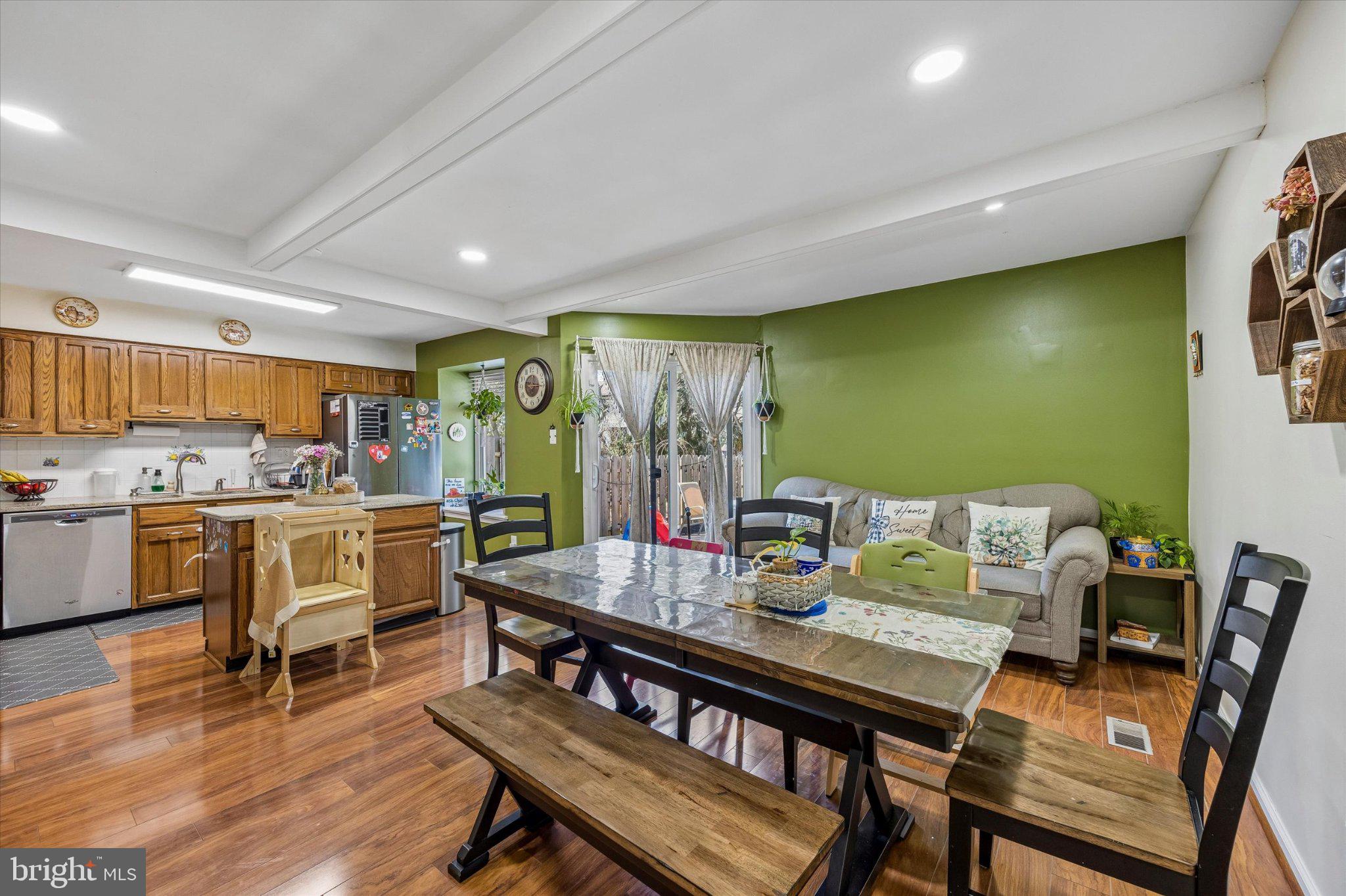 24 Independence Place Newtown, PA 18940 - Photo 5 of 15 a view of a dining room with furniture window and wooden floor