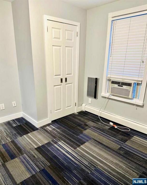 61 Hille Place, Unit 2 Ridgefield Park, NJ 07660 - Photo 9 of 19 a view of a room with wooden floor