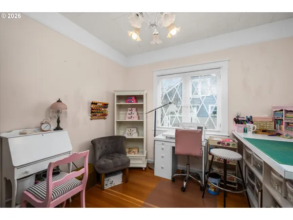 a workspace with furniture and a window