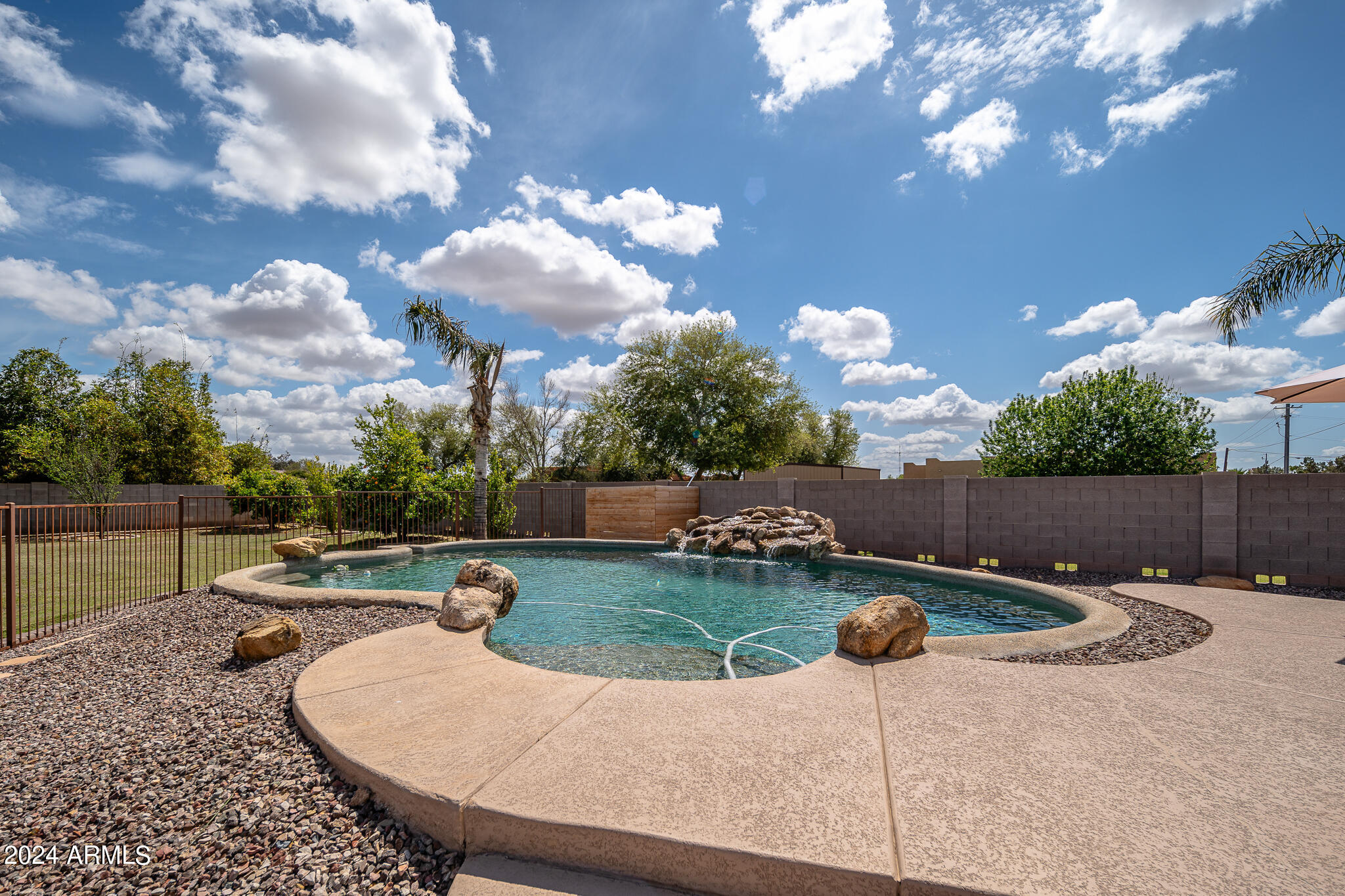 17443 West Lamar Road Waddell, AZ 85355 - Photo 42 of 67 42_Back-Yard_01