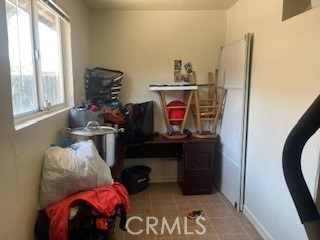 1020 West 24th Street Merced, CA 95340 - Photo 18 of 21 a living room with furniture and a window